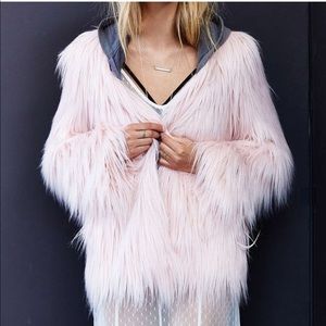 Urban Outfitters pink faux fur coat